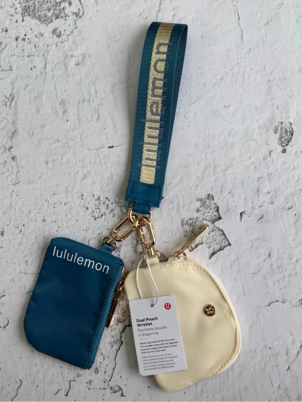 lululemon athletica Dual Pouch Wristlet in Teal and Cream with Branded Strap